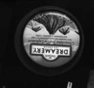 Lids are inspected and identified at any angle.